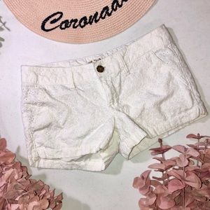 White lace shorts